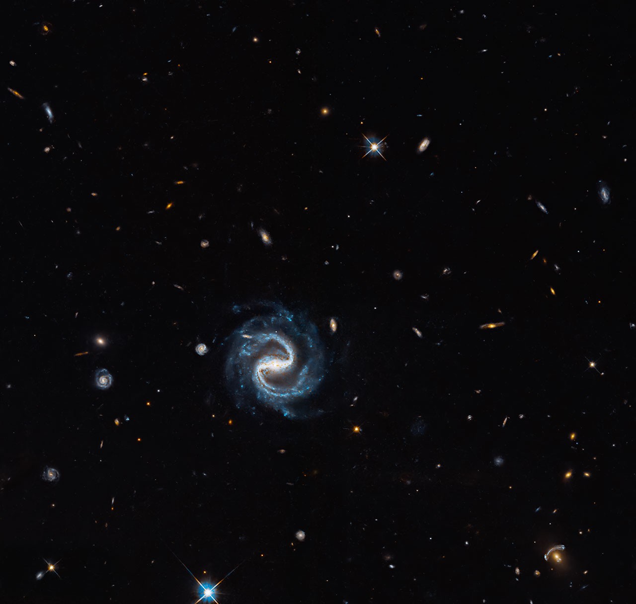 Hubble gravitational lens helps prepare Roman dark-matter studies